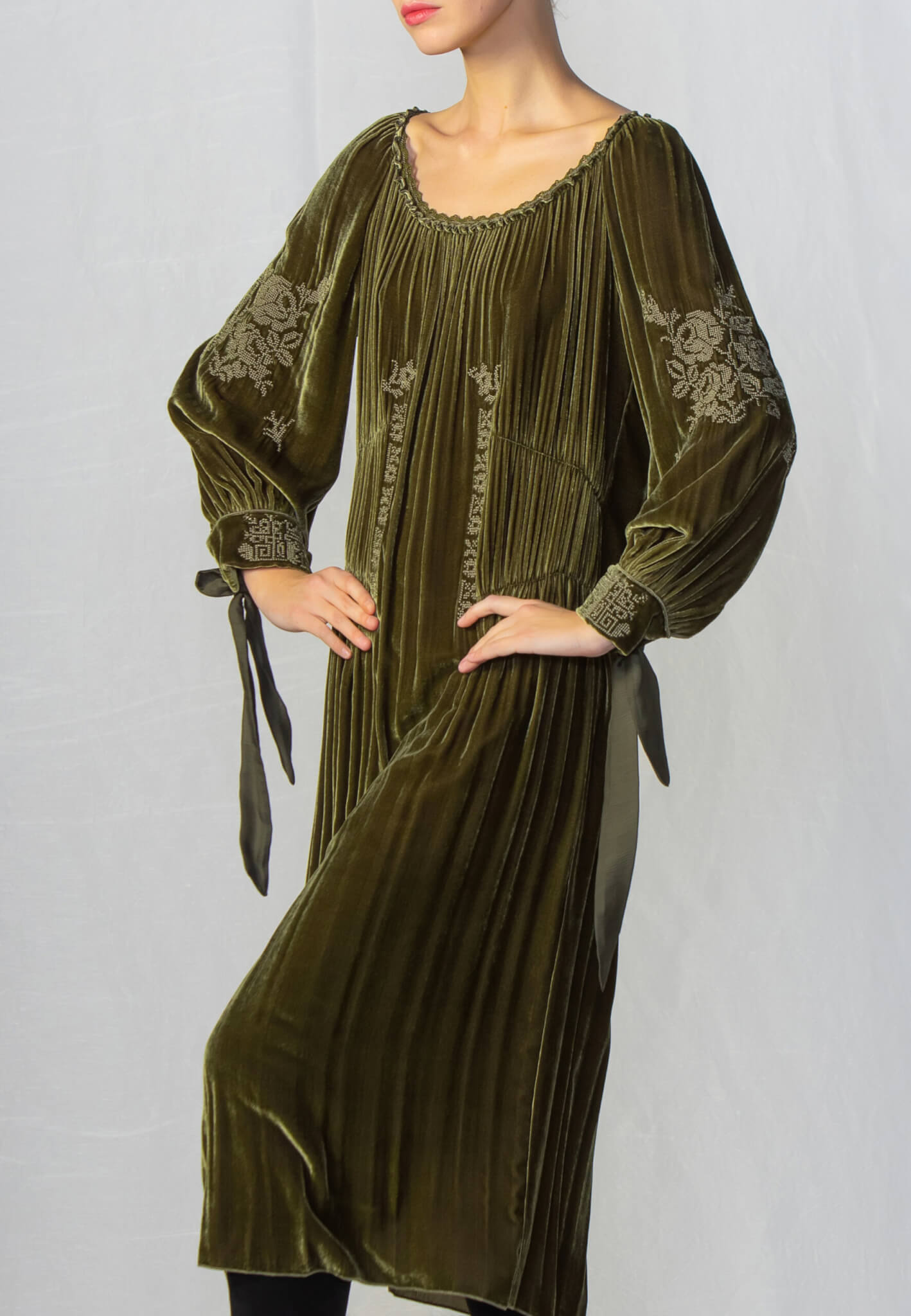 Green velour dress with embroidery