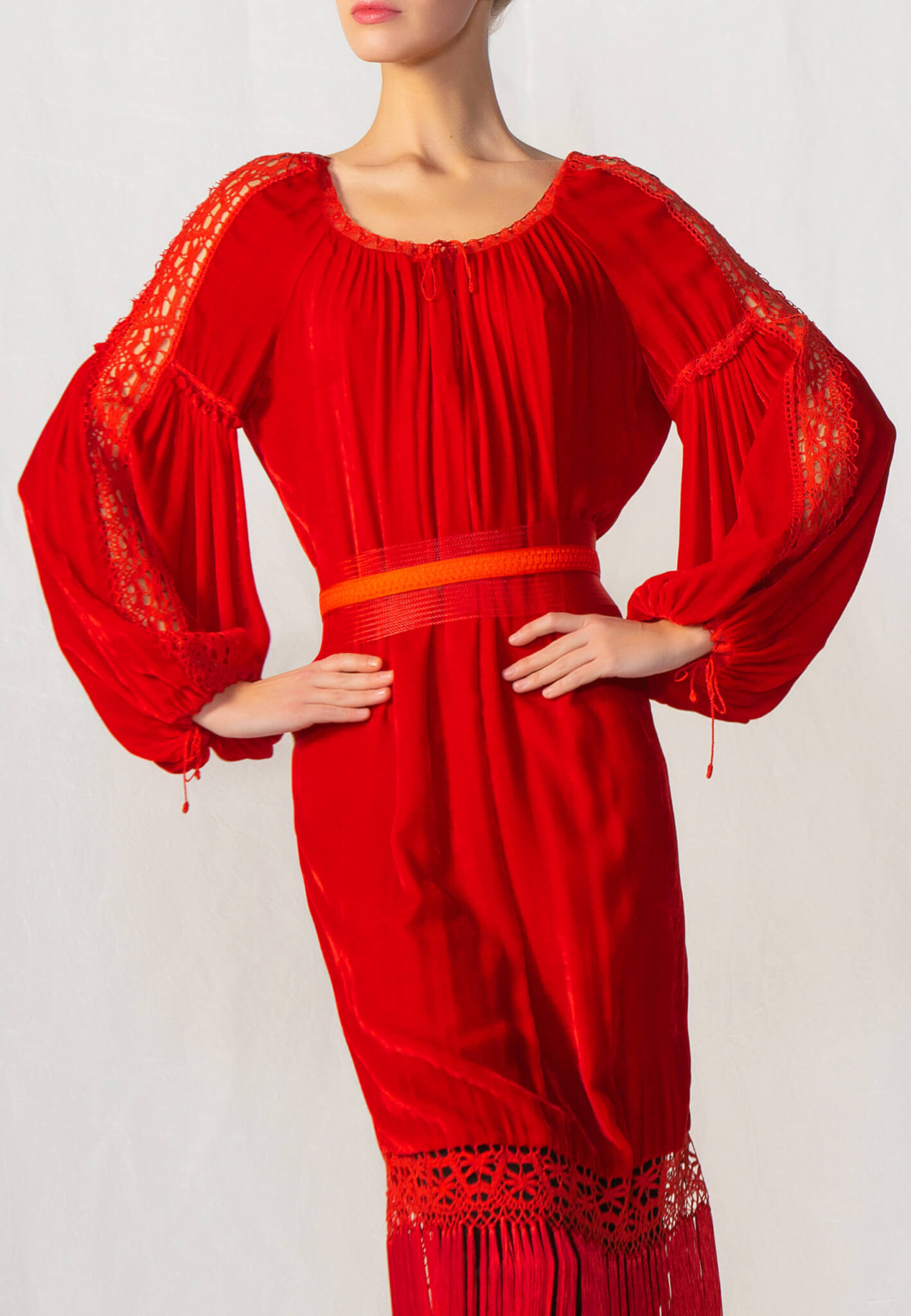 Red velour dress with tassels